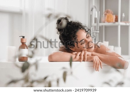 Similar – Image, Stock Photo Young happy woman taking a selfie in front of the mirror
