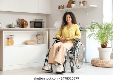 Young African-American woman in wheelchair at home - Powered by Shutterstock