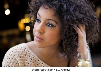 Young afro american woman in an old fashion style