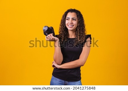 Similar – Foto Bild Eine lächelnde Frau, die eine Taube aus ihrer Hand füttert.