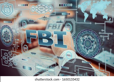 A young agent a futuristic smartphone with the latest holographic technology augmented reality with the inscription "fbi".