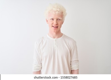 Young Albino Blond Man Wearing Casual T-shirt Standing Over Isolated White Background With A Happy And Cool Smile On Face. Lucky Person.