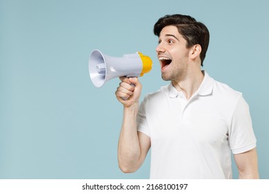 Young amazed excited expressive fun caucasian man 20s he in white casual basic t-shirt screaming hot news shout in megaphone isolated on pastel blue background studio portrait People lifestyle concept - Powered by Shutterstock