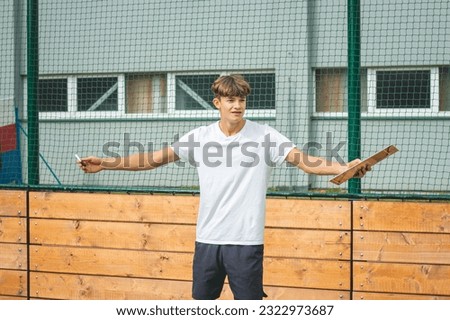 Image, Stock Photo Young, ambitious coach instructs his players on what to do on the field. Coaching games from behind the line. Mentality and crisis preparedness