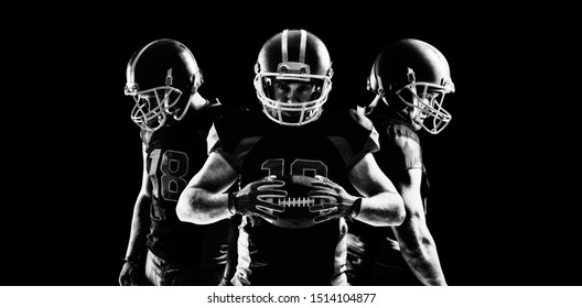 Young American football player in helmet standing and looking down - Powered by Shutterstock