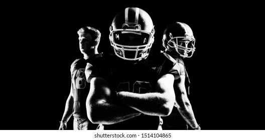 Young American Football Player Standing In Helmet 