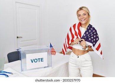 Young American Politic Party Worker Smiling Happy Wearing United States Flag At Electoral College.