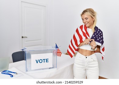 Young American Politic Party Worker Smiling Happy Wearing United States Flag At Electoral College.