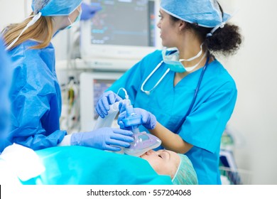 Young Anesthesiologist At Her Work