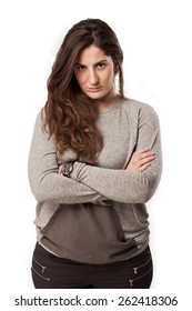 Young Angry Woman With Arms Crossed