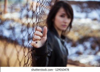 Young Anonymous Woman Staring At Camera.