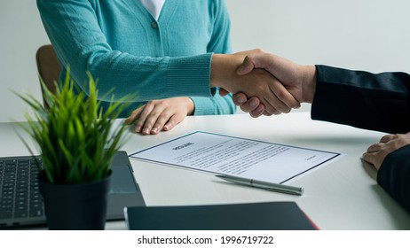 Young applicants who are serious about their work experience. and first impression in a modern office interview The recruiter will consider the resume. The HR manager will consider the employee's resu - Shutterstock ID 1996719722