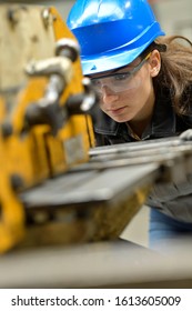 Young Apprentice Using Steelworks Machine