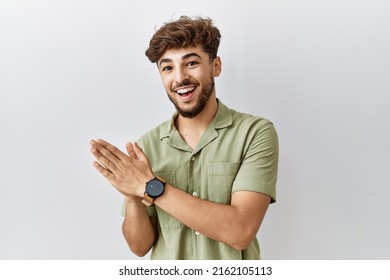 Young Arab Doctor Man Standing Over Isolated Background Clapping And Applauding Happy And Joyful, Smiling Proud Hands Together 