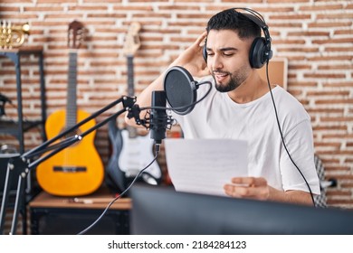 Young Arab Man Artist Singing Song At Music Studio