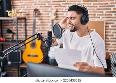 Young Arab Man Artist Singing Song At Music Studio