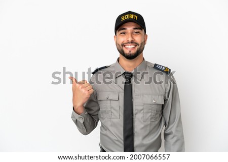 Young arab man isolated on white background pointing to the side to present a product