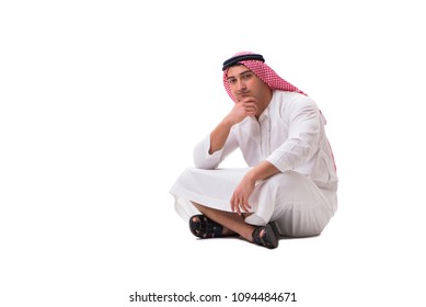 Young Arab Man Sitting Isolated On White