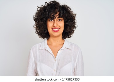 Young Arab Woman With Curly Hair Wearing Casual Shirt Over Isolated White Background With A Happy And Cool Smile On Face. Lucky Person.