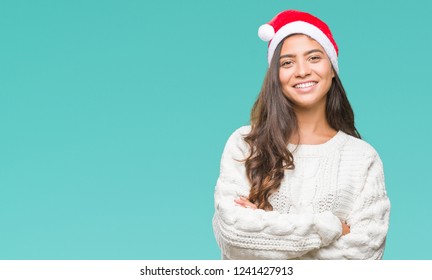 Young Arab Woman Wearing Christmas Hat Over Isolated Background Happy Face Smiling With Crossed Arms Looking At The Camera. Positive Person.