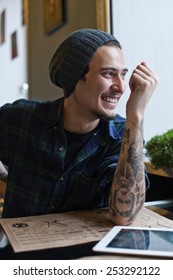 Young Arabian Man With Tatoo: Smiling