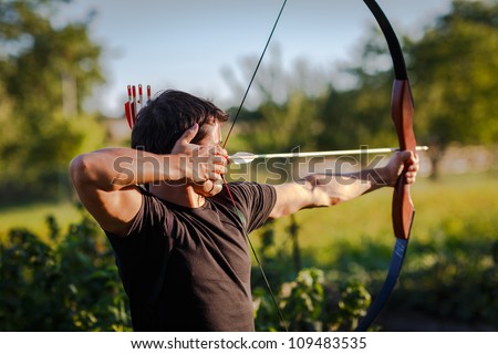 Young archer training with the  bow