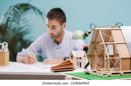 A Young Architect Engaged In The Design Of An Innovative Modular, Zero-impact Housing Structure. Concept Of New Solutions For Sustainable Architecture. 