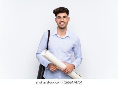 Young architect man over isolated white background laughing