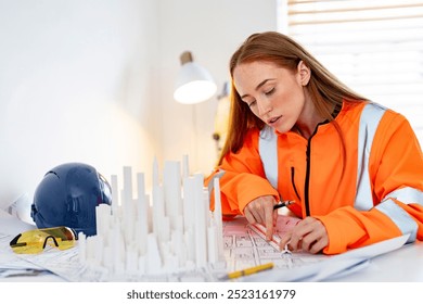 A Young Architect Meticulously Reviews Plans While Designing a Model in a Bright Workspace - Powered by Shutterstock