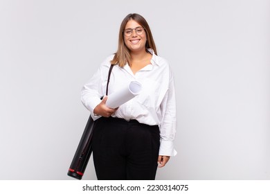 young architect woman looking happy and pleasantly surprised, excited with a fascinated and shocked expression - Powered by Shutterstock