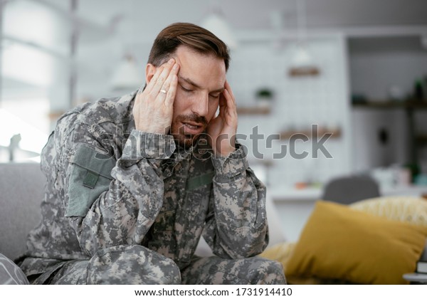 Young Army Soldier Having Headache Young Stock Photo 1731914410 ...