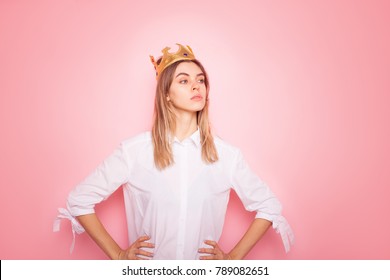 Young Arrogant Woman In Crown On Pink Background