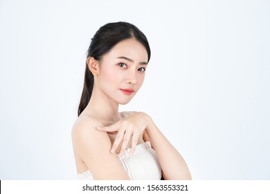 Young asian beautiful girl in white undershirt, has healthy and bright skin.
