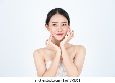 Young asian beautiful girl in white undershirt, has healthy and bright skin.