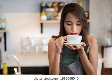 Young Asian Beautiful Woman Drinking Coffee.