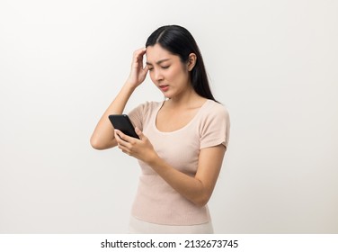 Young Asian Beautiful Woman Feeling Upset Looking At Smartphone Screen.