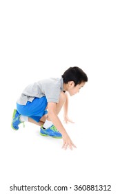 Young Asian Boy Prepare To Start Running Race On White Background