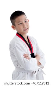 Young Asian Boy Training Taekwando On White.