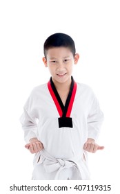 Young Asian Boy Training Taekwando On White.