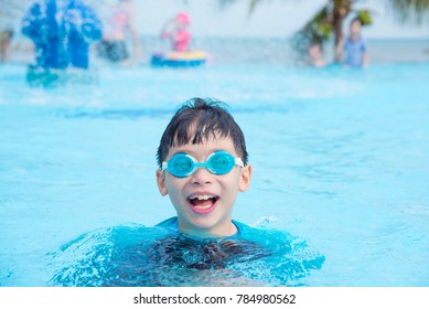 Young Asian Boy Wearing Goggles Swimming Stock Photo 784980562 ...