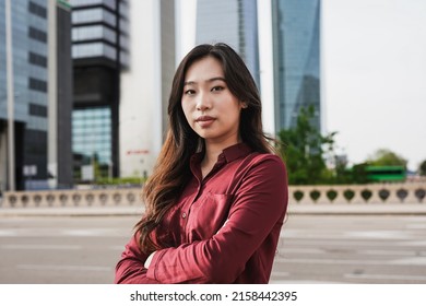 Young Asian Buisness Woman Looking Serious On Camera