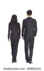 Young Asian Business Man And Woman Walking, Rear View, Isolated On White Background.