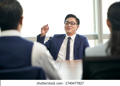 young asian business person talking big in front of hr interviewers during job interview - Shutterstock ID 1740477827