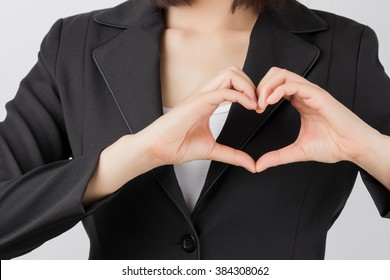 Young Asian Business Woman Making Heart Shape By Her Hands.