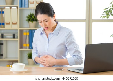 2,439 Woman Stomach Pain Office Images, Stock Photos & Vectors ...