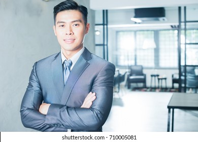 Young Asian Businessman. Image With Lens Flare Effect.