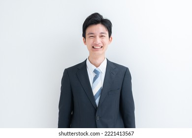 Young Asian businessman with a smile - Shutterstock ID 2221413567