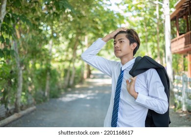 Young Asian Businessman Suffers From Depression And Stress Is Laid Off Due To Economic Problems Feels Hopeless Has Financial Anxiety.