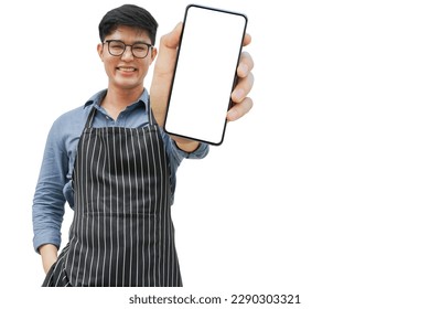 young asian businessman wear apron smile and hold blank screen mockup smartphone isolated on white background for advertise and promote content of SME business service online and franchise concept - Powered by Shutterstock