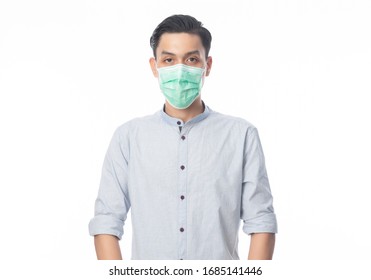 Young Asian Businessman wearing hygienic mask to prevent infection, 2019-nCoV or coronavirus. Airborne respiratory illness such as pm 2.5 fighting and flu isolated on white background. - Shutterstock ID 1685141446